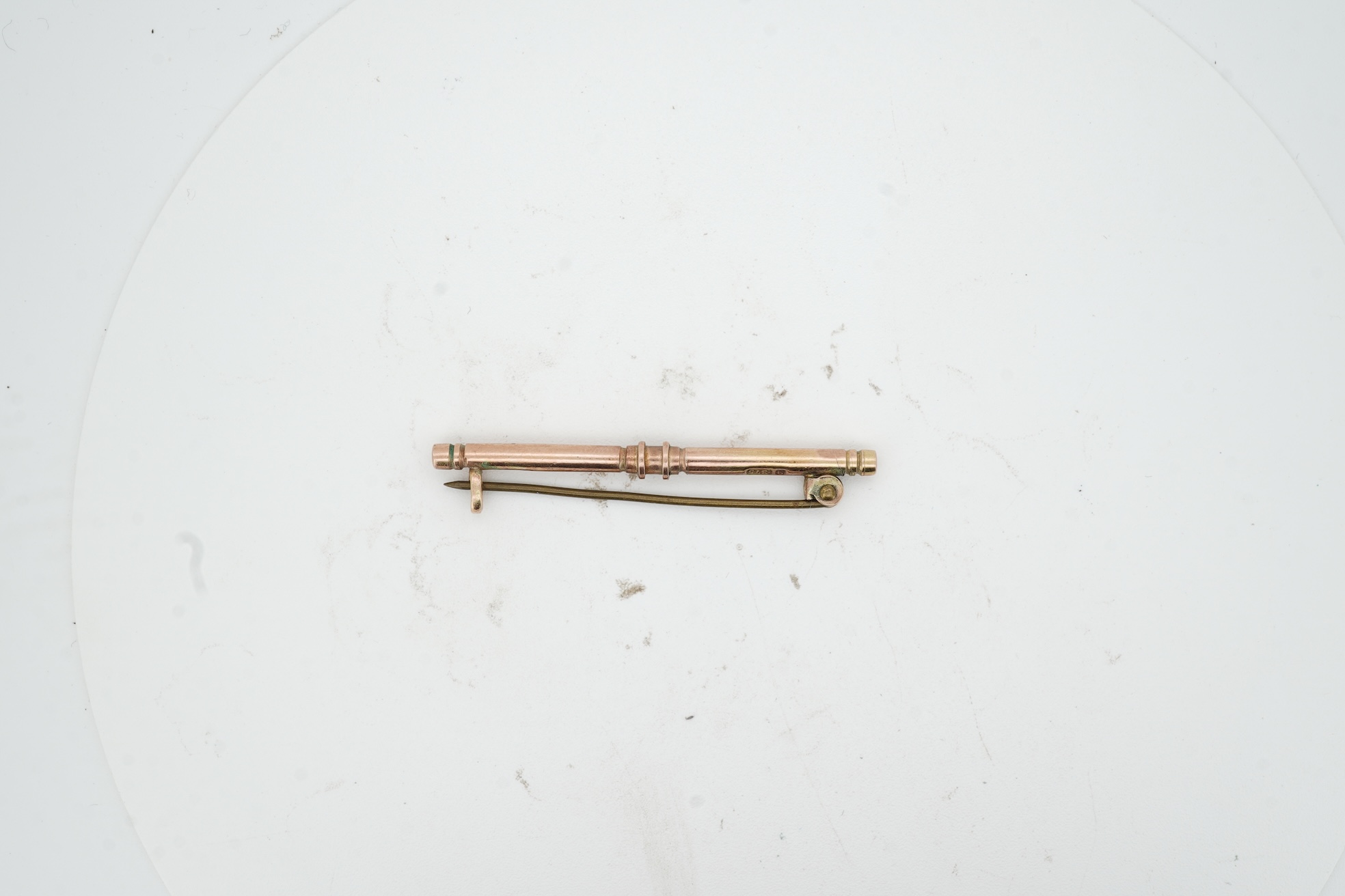 A pair of 18ct gold cufflinks, each end of oval outline, connected by chain linking, engraved with the initials RWA, length 1.8cm each, British hallmarks, combined gross weight approximately 7.5 grams